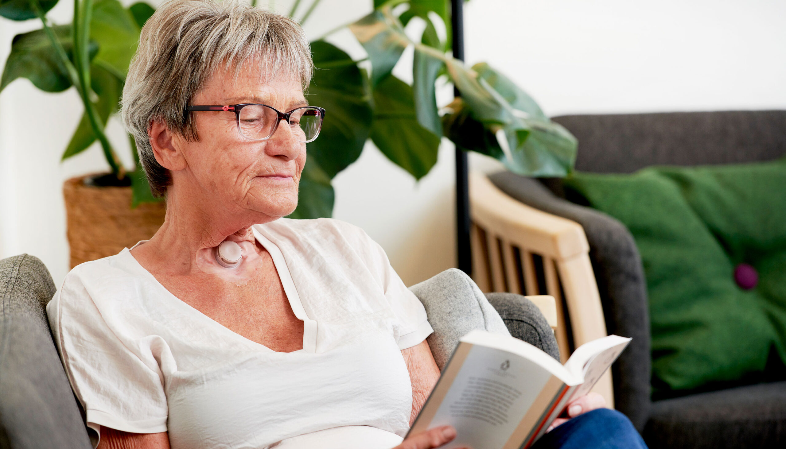 Woman and doctor maintaining stoma care at home